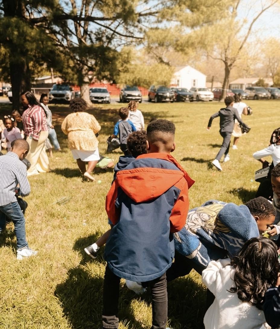 Families and children taking part in a Faith Family Life Church community outreach event